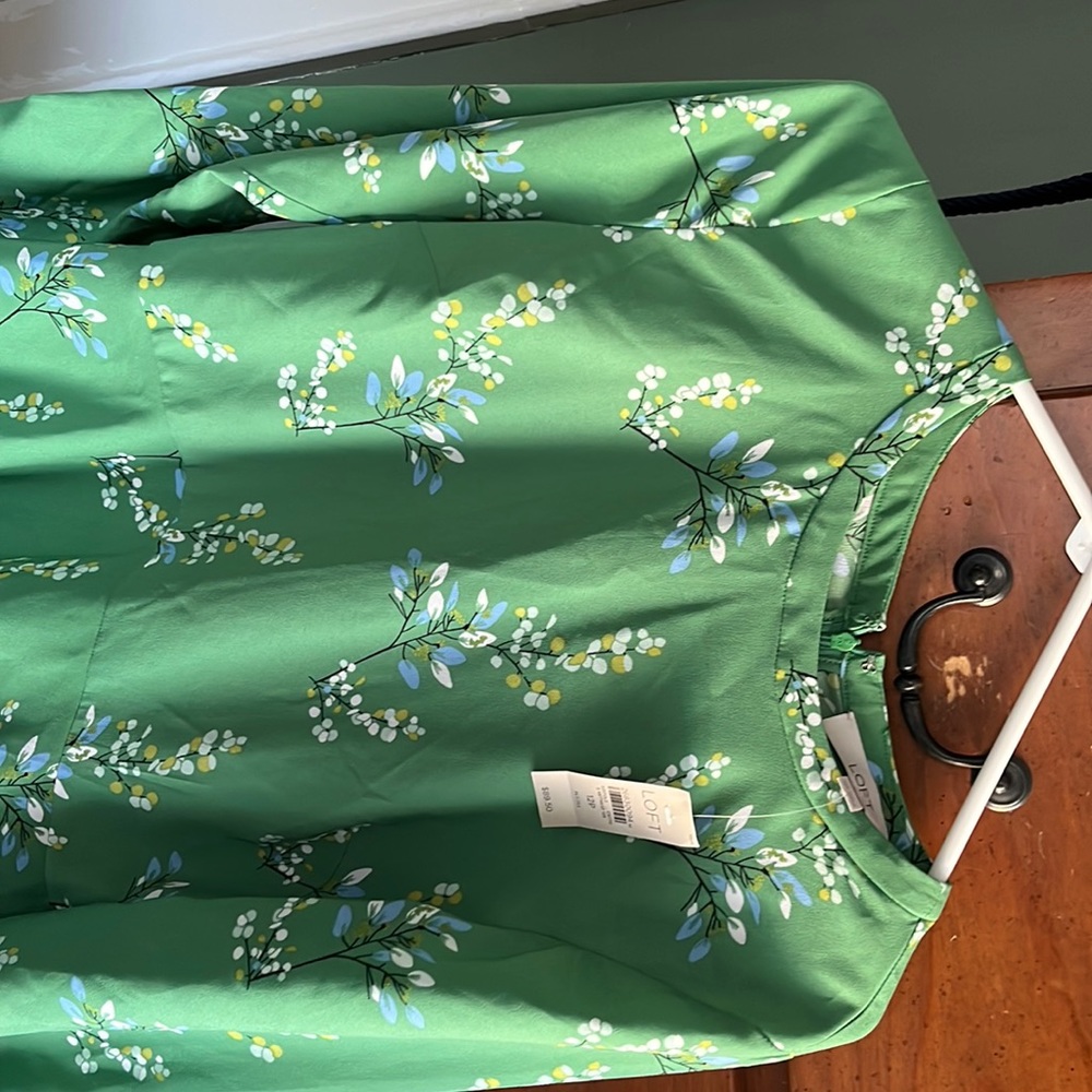 Green and white flowered long sleeve dress